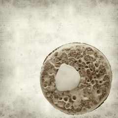 textured old paper background with buttered cumpet