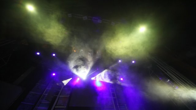 stage of nightclub with dynamic disco searchlights
