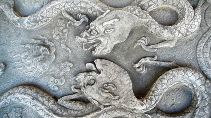 Fototapeta na wymiar Historical stone carvings of dragon