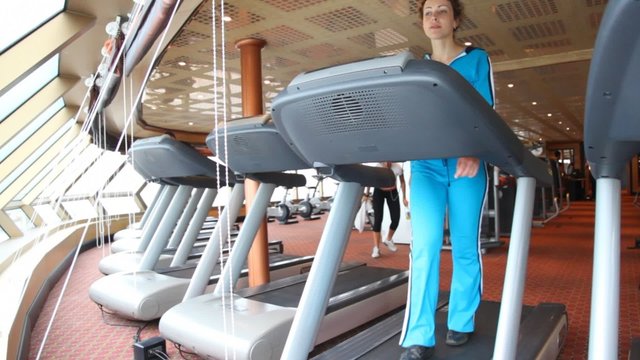 woman is exercising in gym