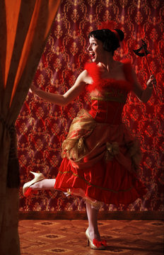 Lady in red dress at the carnival