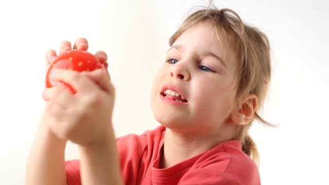girl with kitchen timer in strawberry form