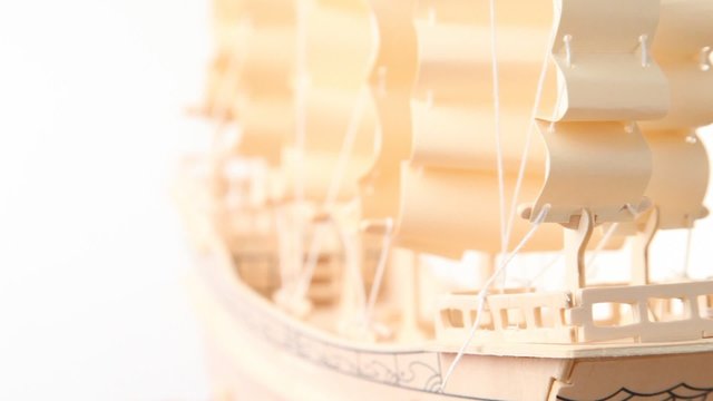 extremely close-up shot of model of ship rotating