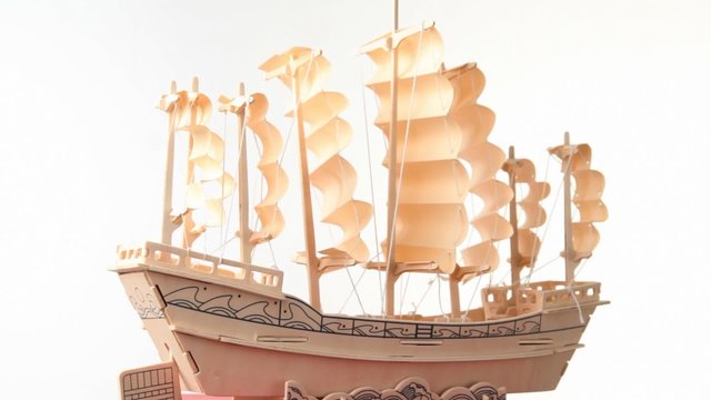 wooden model of ship rotating