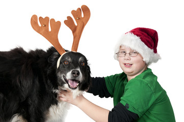 A Christmas boy and his reindeer dog