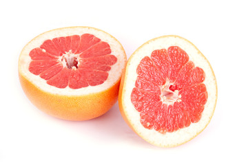 Ripe sliced grapefruit isolated on white background.