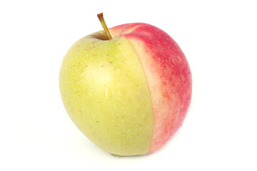 Ripe apple with water drops isolated on white background.
