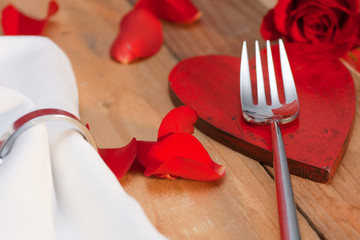 Place setting on a wooden table in country style