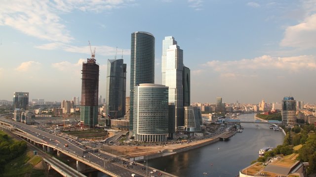 Modern skyscraper city located on river bank, Moscow
