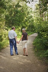 Naklejka na ściany i meble Husband And Wife On Walking Trail