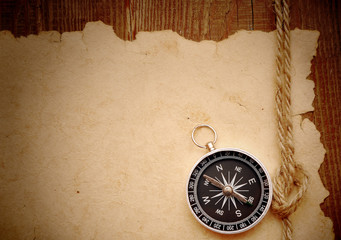 compass and rope on grunge background
