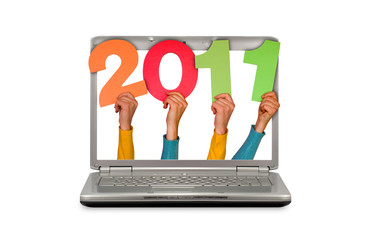 hands in computer screen shows year 2011
