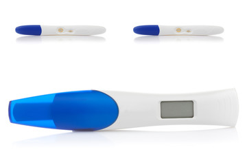 Digital pregnancy test with blank screen and two regular tests w