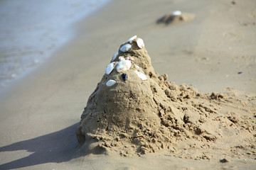 Sandburg Ostseestrand. Sand castle on the Baltic beach.