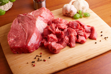 Raw beef on cutting board