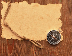 compass and rope on grunge background