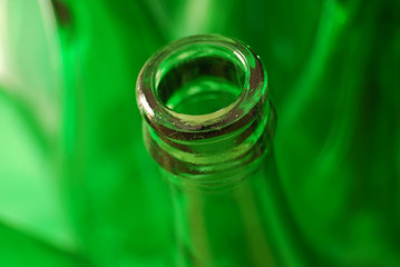 Empty green glass bottle