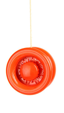 Red yo yo isolated on white background