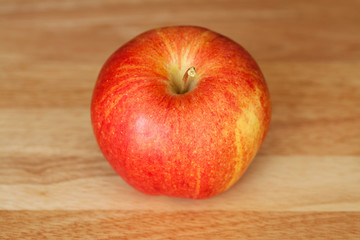 Apple on rustic wood background