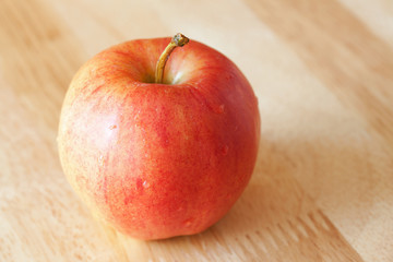 Apple on rustic wood background