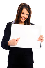 Naklejka premium Businesswoman holding a white board