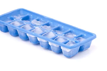 Zelfklevend Fotobehang Frozen Ice Cube Tray © ArenaCreative