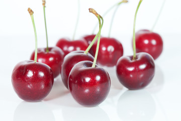 Cherries on white background
