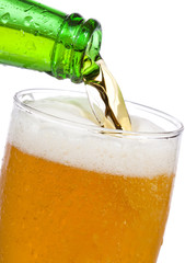 Beer is Pouring into glass