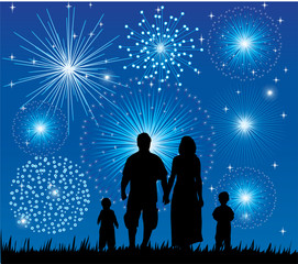 happy family watching fireworks