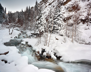 Fototapeta na wymiar mountain river in winter time