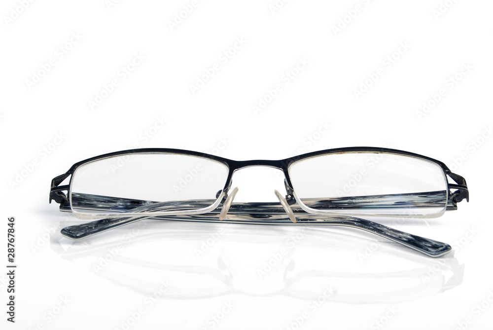 Wall mural Eyeglasses on white background