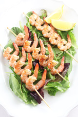 Prawn Skewers on Green Salad