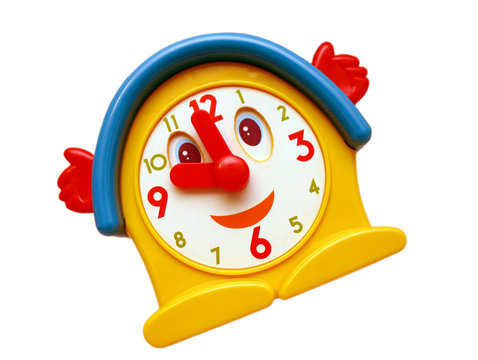 Smiling old toy clock