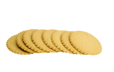 row of fresh baked sugar cookies on a white background