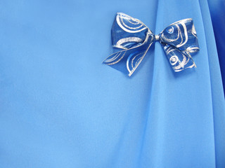 blue bow on the blue background