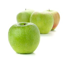 Four ripe green apples