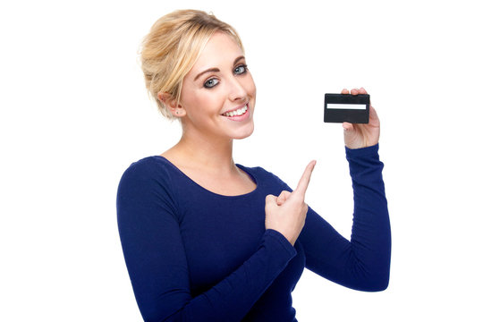 Attractive Woman Pointing at Credit Card