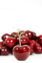 Fresh red cherry isolated on white background