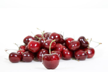 Fresh red cherry isolated on white background