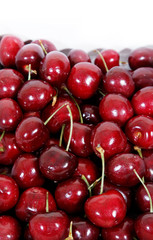 Fresh red cherry isolated on white background