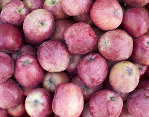 raw red apples closeup at the local market