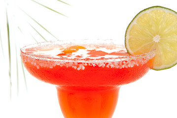 Strawberry margarita cocktail with lime and ice