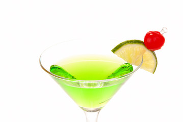 Green apple martini cocktail with lime and cherry