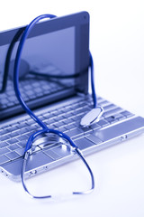 Laptop, notebook and Stethoscope