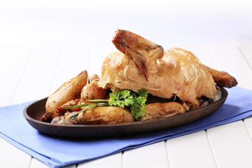 Chicken and baked potatoes