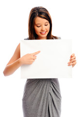 Fototapeta premium Pretty girl holding a white board