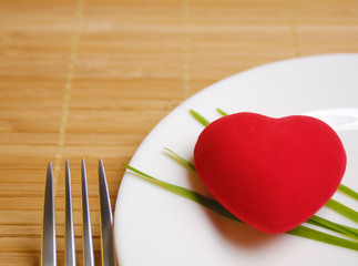 Red heart served on the plate