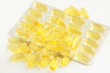 yellow transparent capsules of fish oil