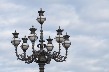 Fototapeta na wymiar Large lamp post in a square