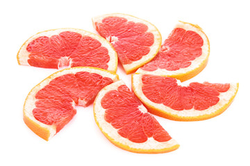 Slices of grapefruit in the form of circle isolated on white